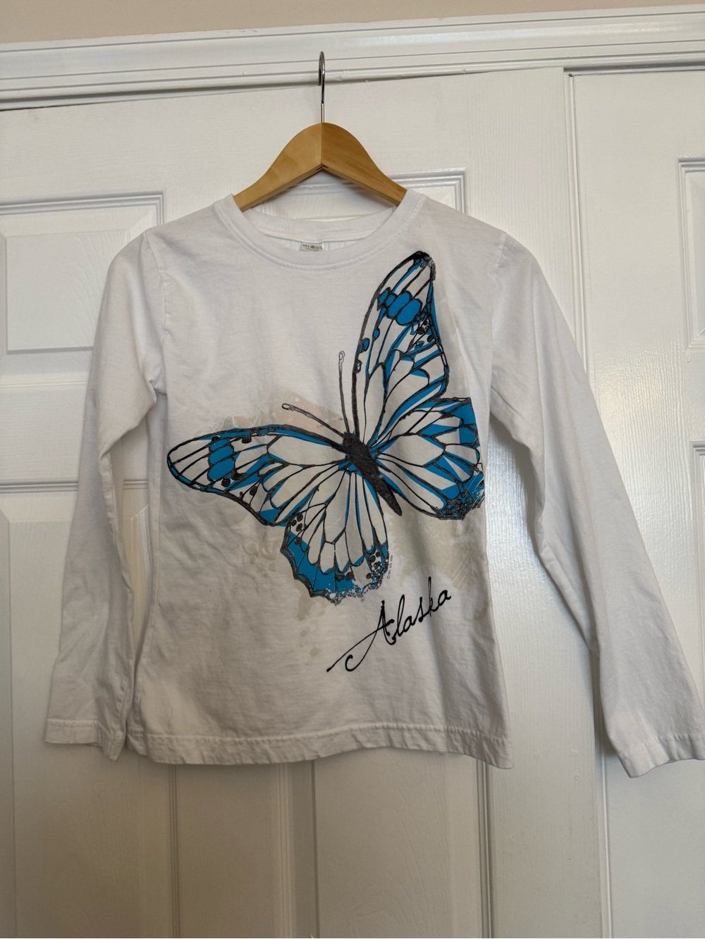 Girls White Long-Sleeve Tee with Blue Butterfly Graphic